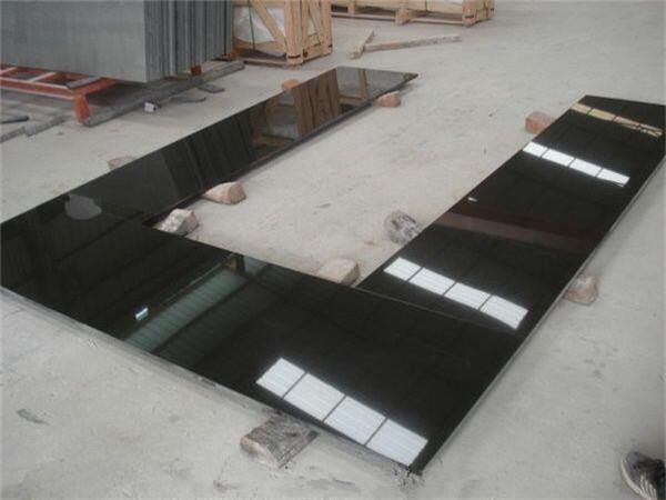 absolute black granite kitchen countertop inspecting