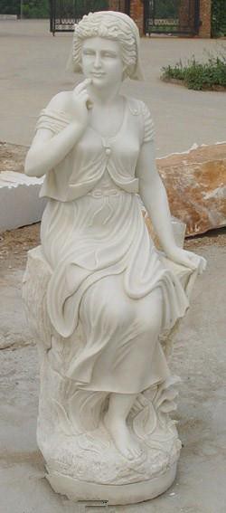 Estatua femenina de mármol