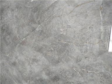 Mármol gris y dorado